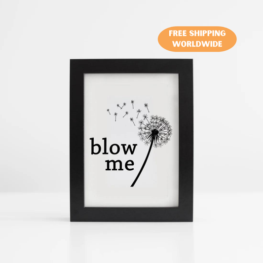A photo of an art print with a blown dandelion on it. Text reads, Blow Me.