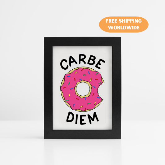 A photo of an art print. It has a half bitten pink donut on it. Text reads, Carbe Diem.