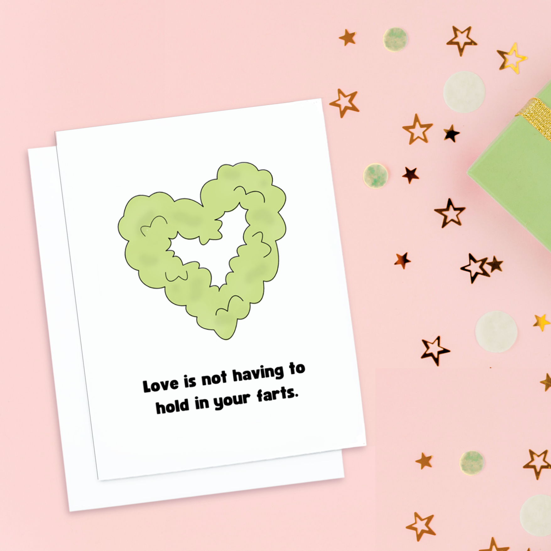 valentines card. It has a green gas shaped heart on it. text reads, Love is not having to hold in your farts.