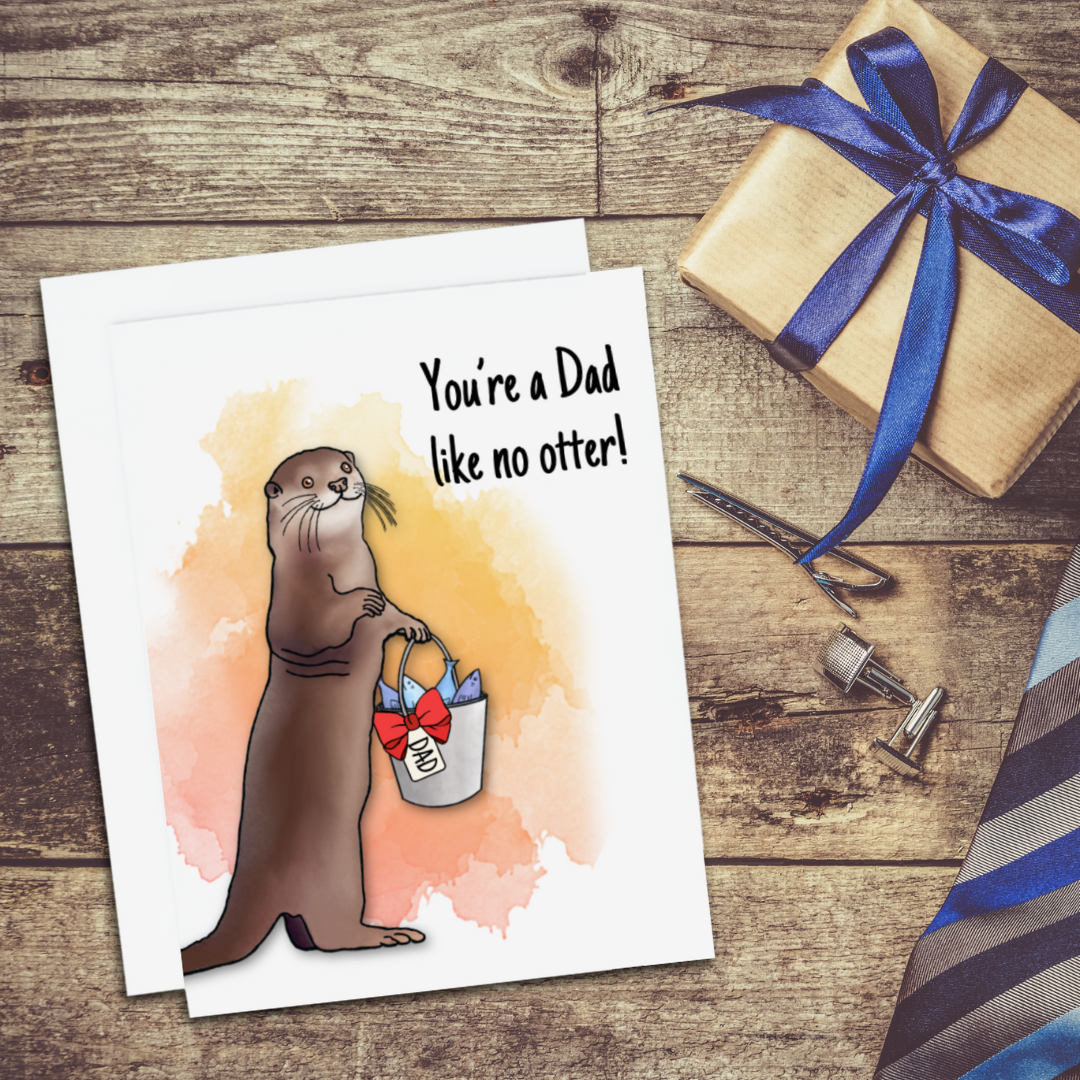 A Father's Day Card. It has an otter holding a gift basket. Text reads, You're a Dad Like No Otter!